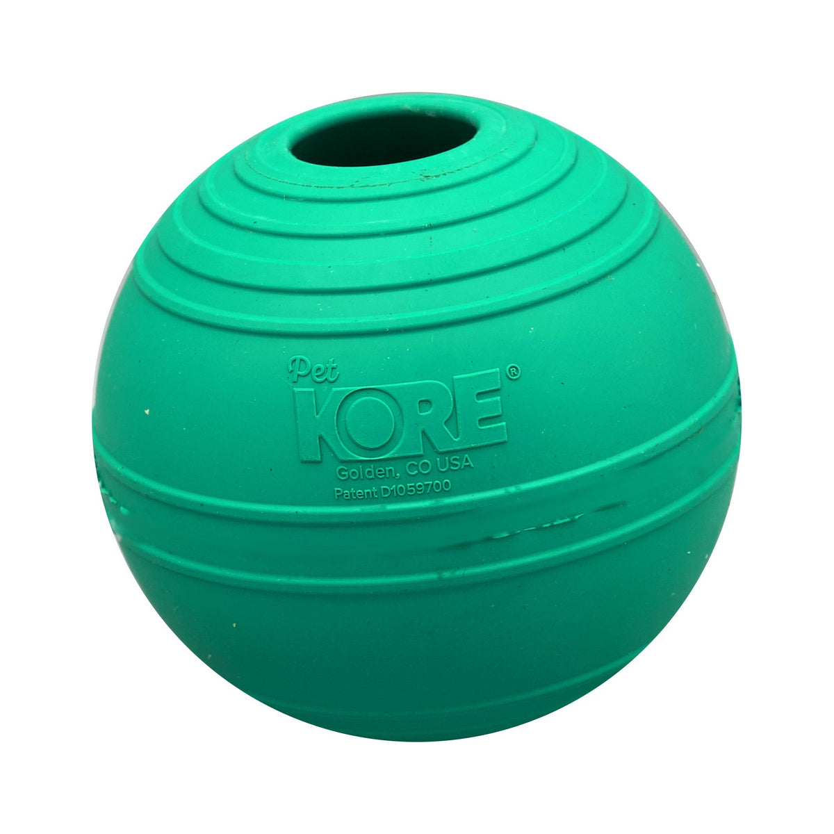 Green KOREflex Squeak dog ball, Medium, side view with the squeaker vent on top and the PetKORE logo